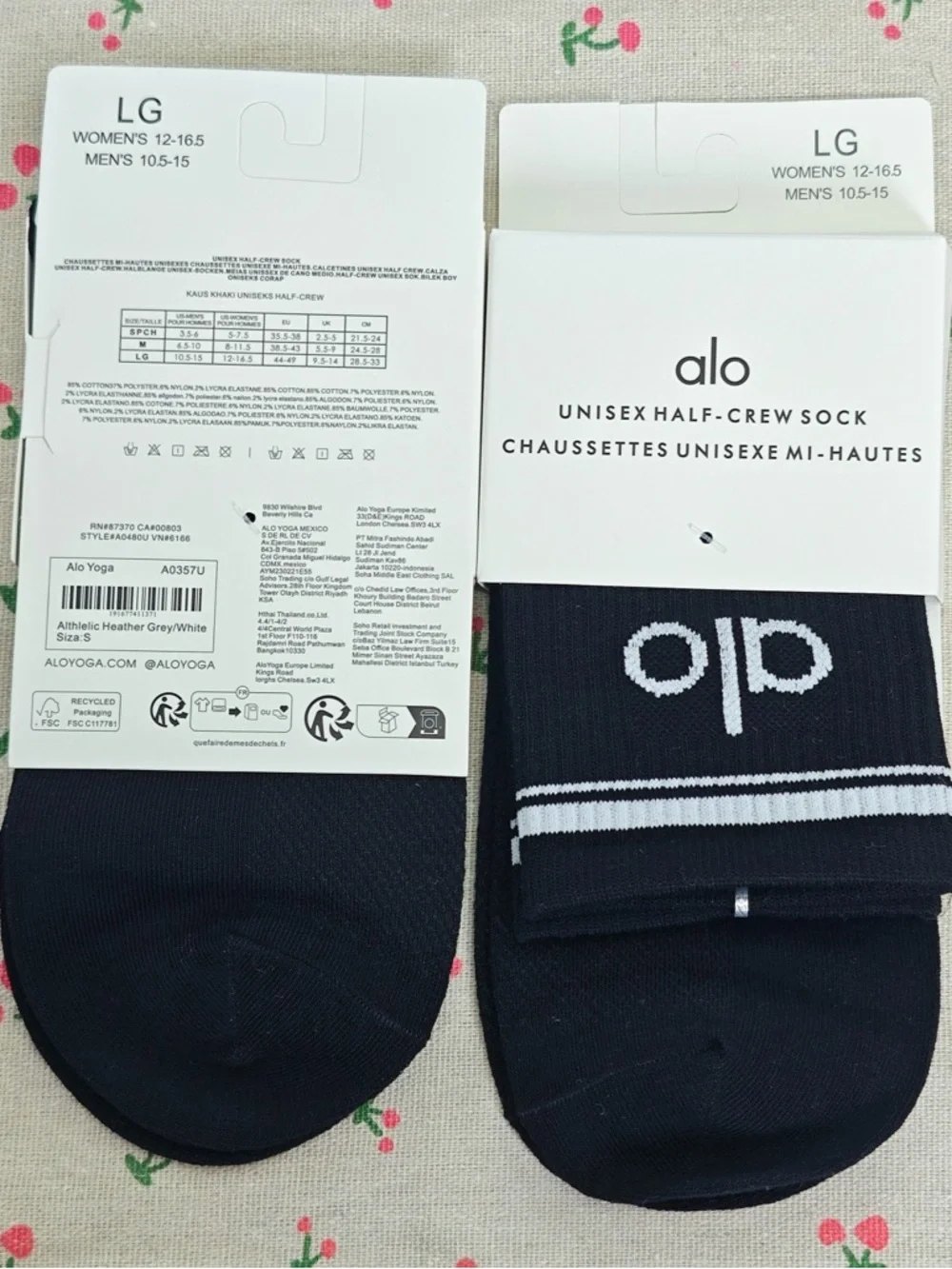 ALO Yoga Black Half-Crew Socks with White Stripes and Logo